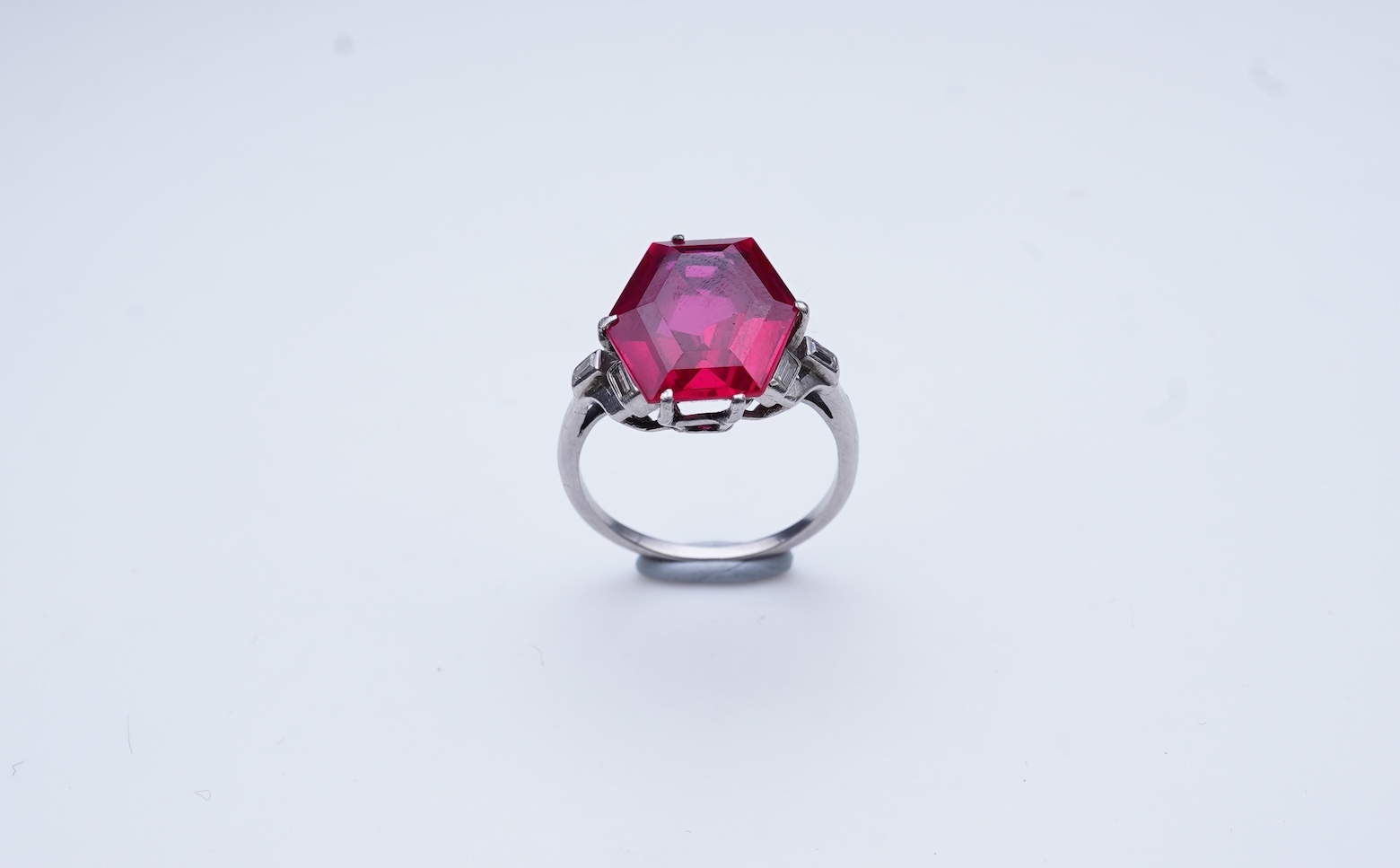A synthetic ruby and diamond ring